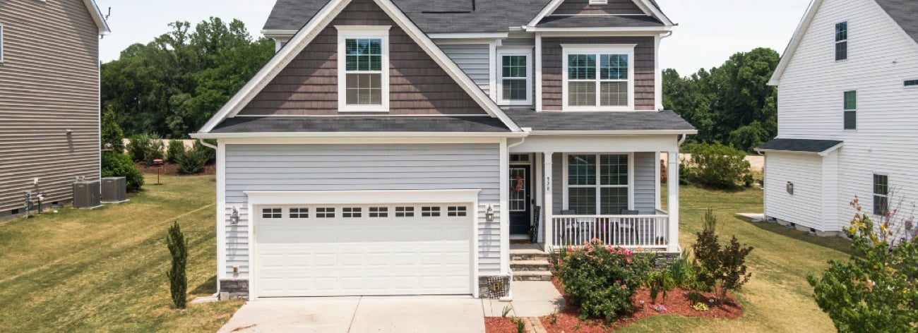 Front View of a House with a New Garage Door