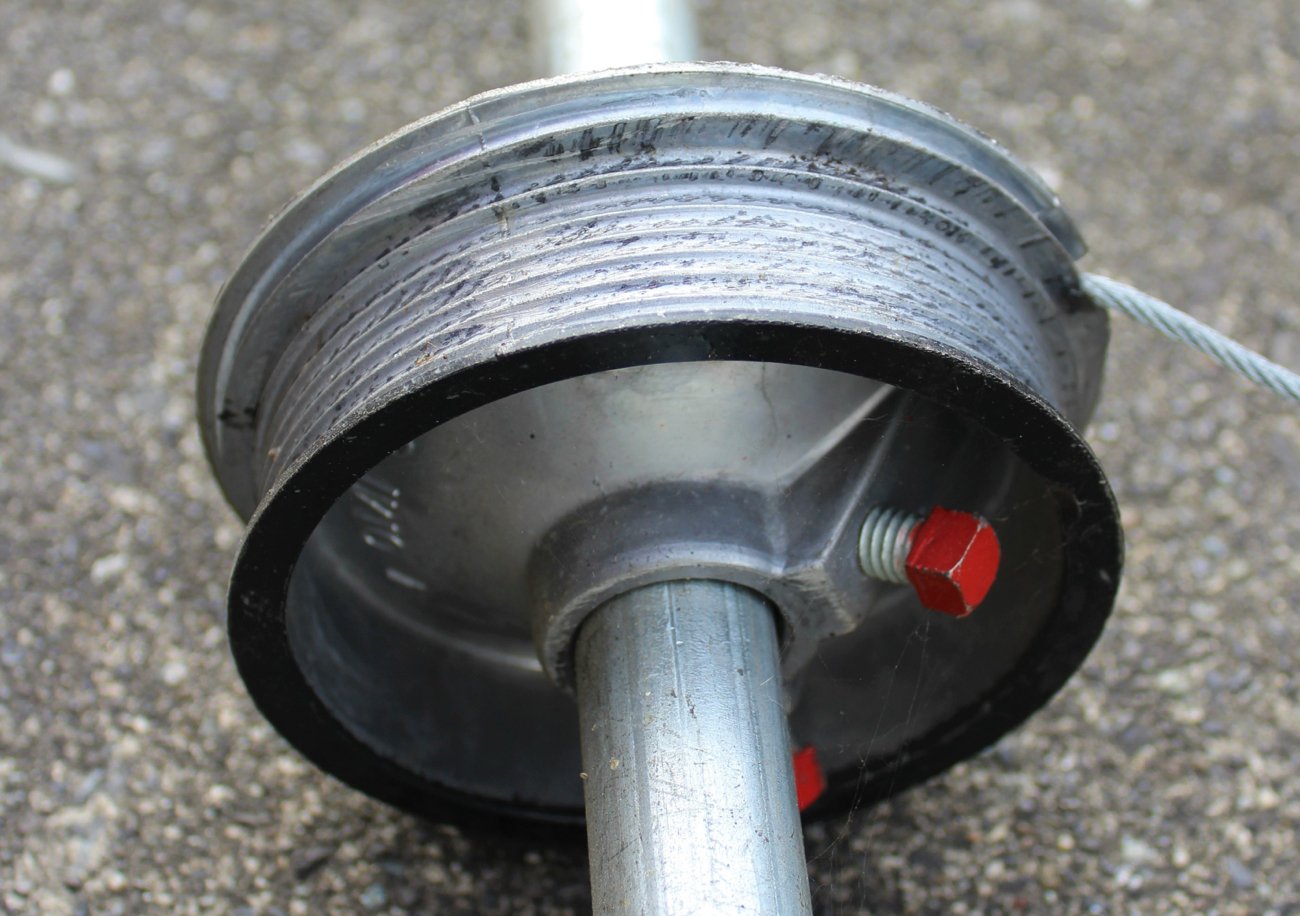 Garage door roller and cable