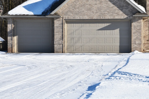Garage Door in the Winter on a Snowy Driveway
