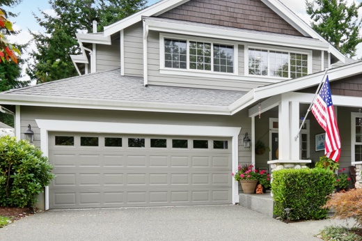 Frontal View of a House with an American Flag