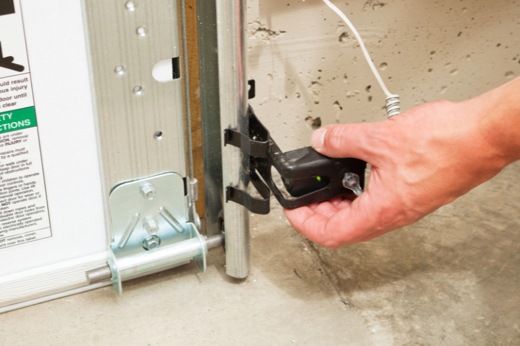 Precision Technician Performing Garage Door Maintenance