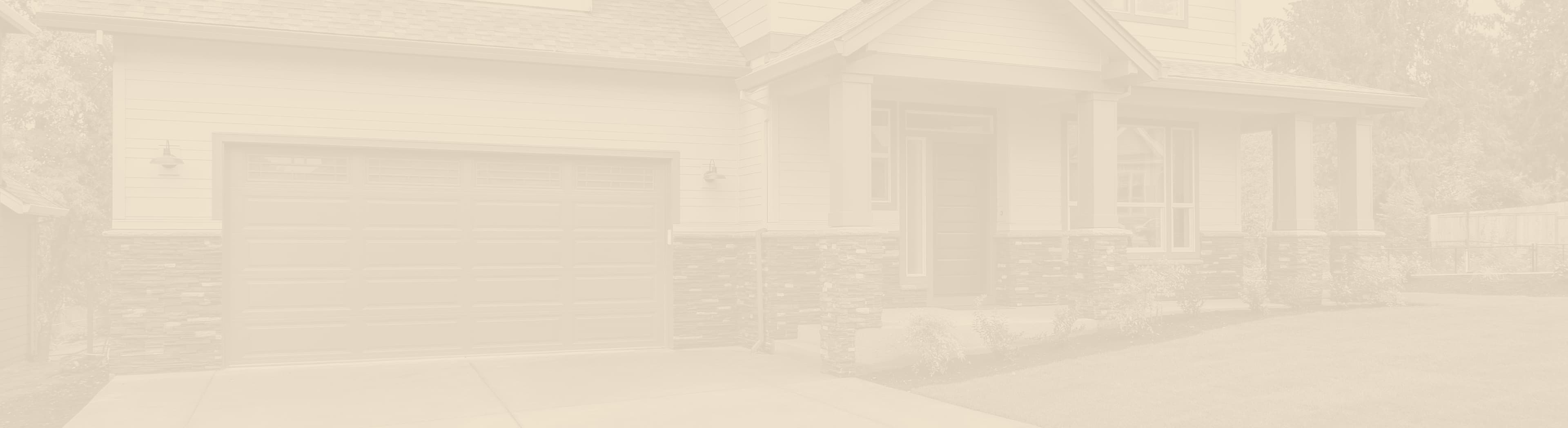 Tan photo overlay of new garage door on exterior of home.