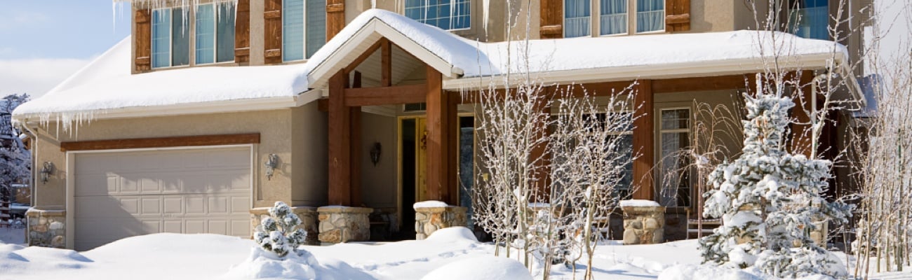 House Covered in Snow During the Winter Season